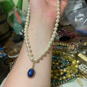 Blue jewel necklace with gold trim